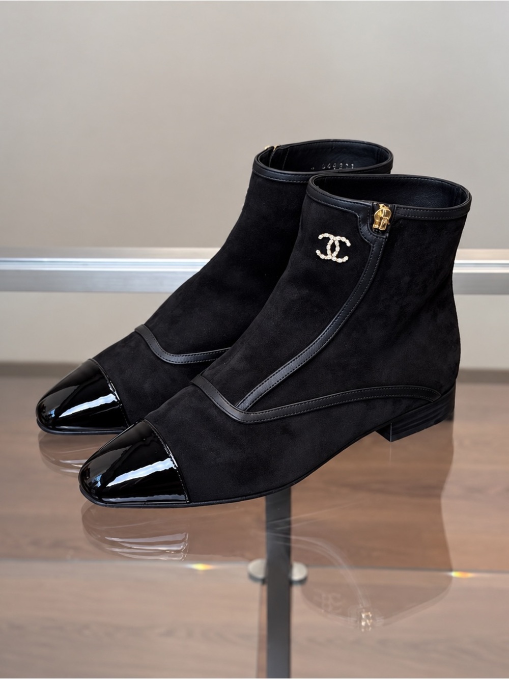 CHANEL Black Suede Ankle Boots with Patent Cap Toe and Gold CC